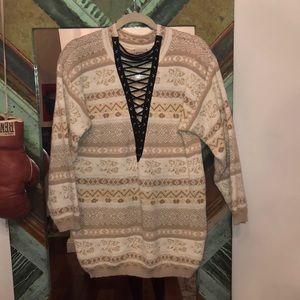 Wool sweater with lace up detail